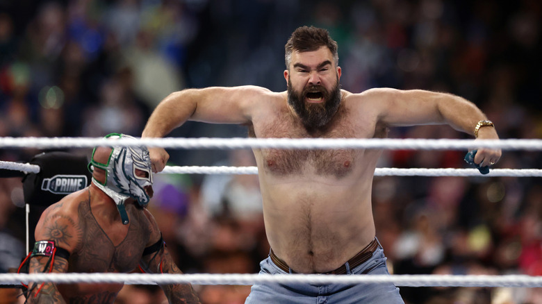 Rey Mysterio and Jason Kelce shirtless wrestling ring