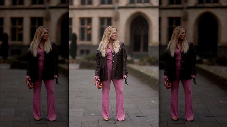 Model wearing fringe jacket