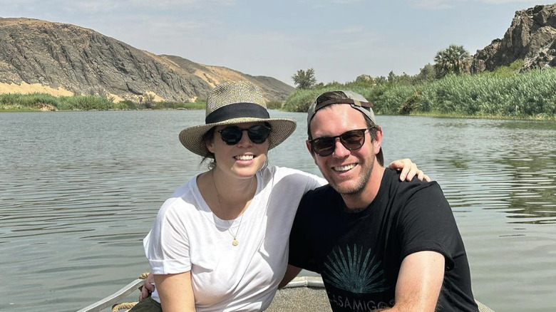 Princess Eugenie and Jack Brooksbank smiling on a boat