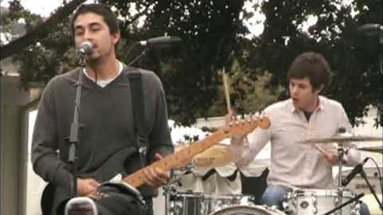 Adam Brody playing drums with Big Japan