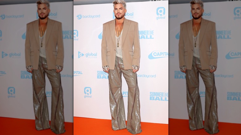 Adam Lambert in a chic camel-colored suit 