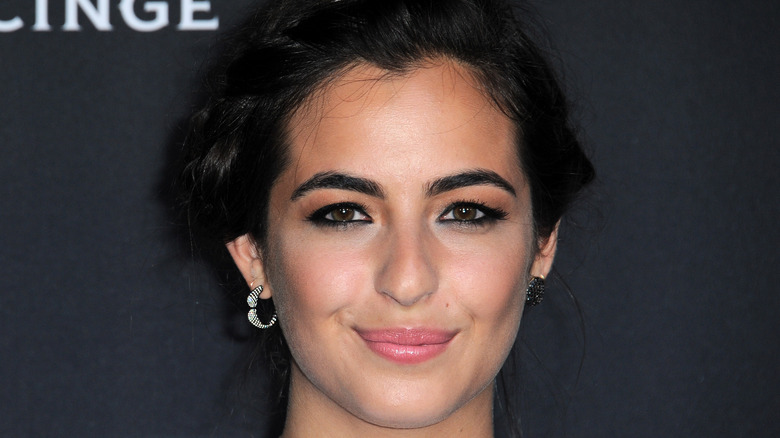 Alanna Masterson with her hair up at an event