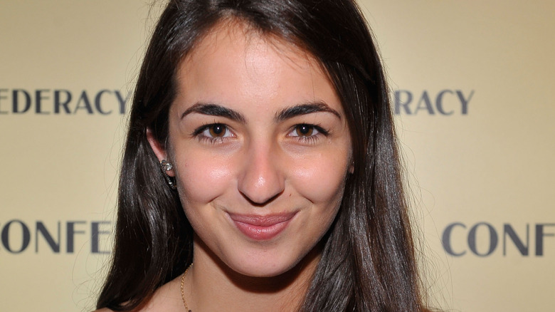 Young Alanna Masterson smiling