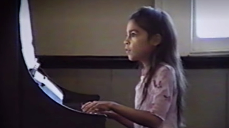 Alexandria Ocasio-Cortez playing the piano