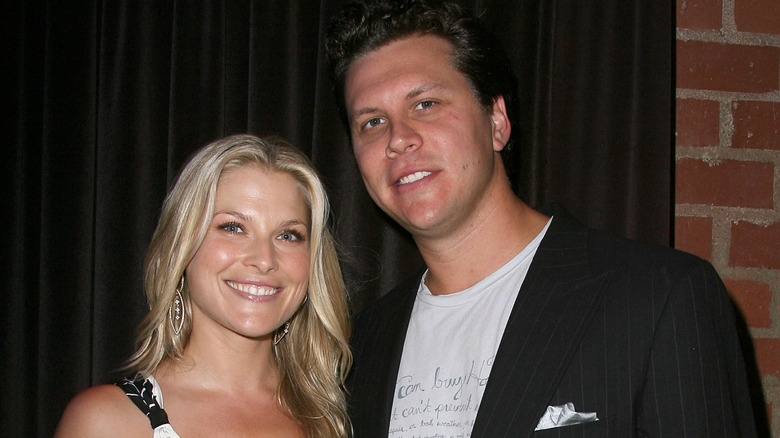 Ali Larter and Hayes MacArthur smiling at a premiere event