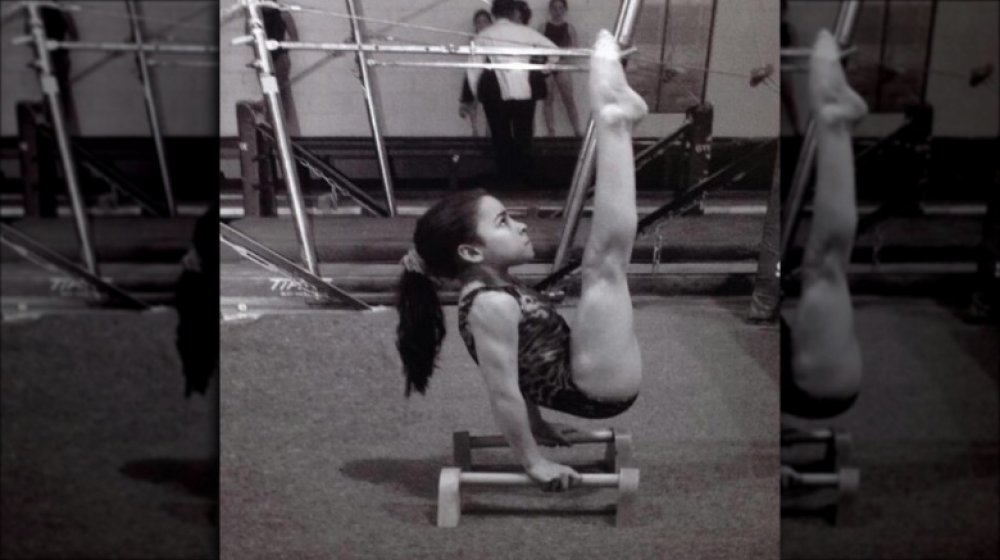 Aly Raisman as a young girl training