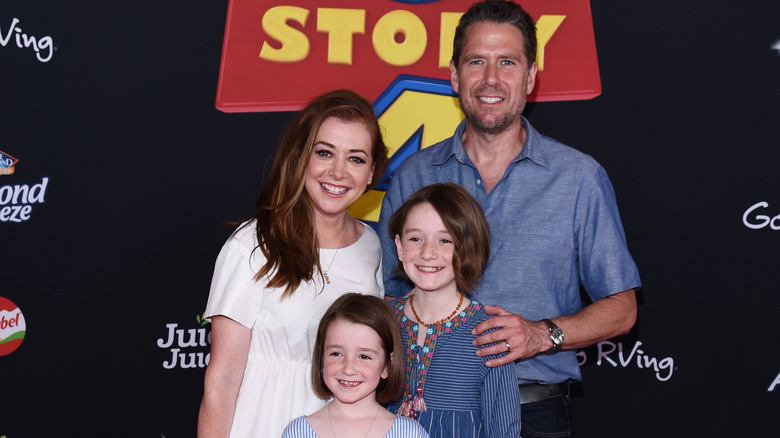 Alyson Hannigan and Alexis Denisof with their daughters