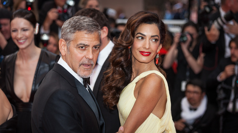 Amal Clooney with George in crowd