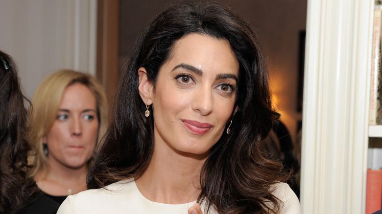 Amal Clooney in white dress