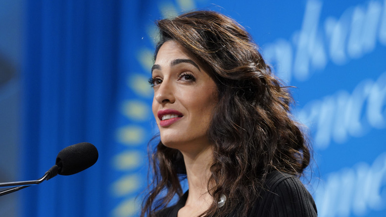 Amal Clooney speaking on mic