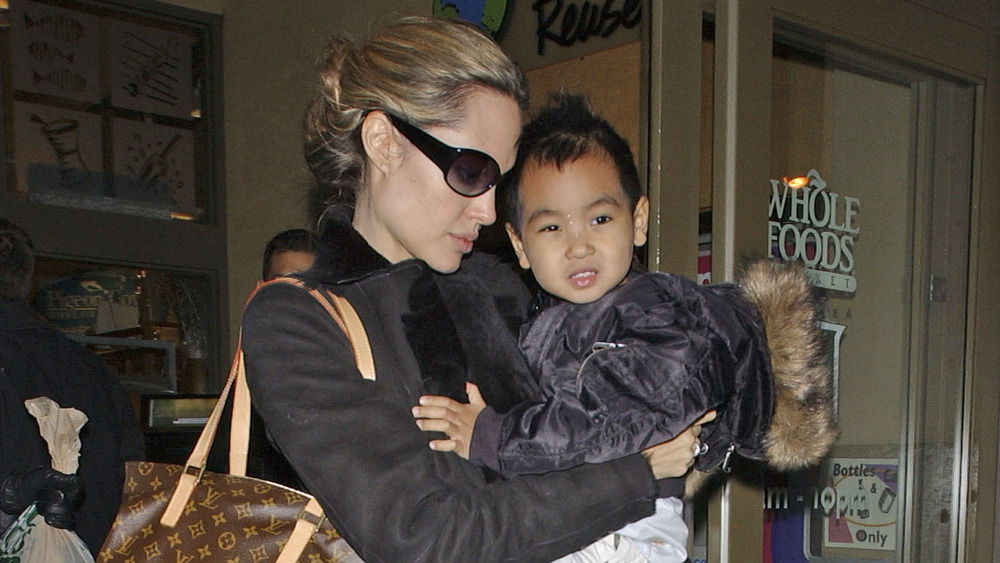 Angelina Jolie holding Maddox Jolie-Pitt in 2005