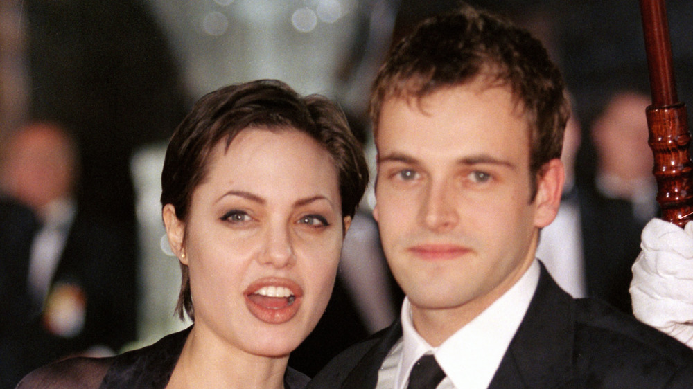 Angelina Jolie and Jonny Lee Miller, year unspecified