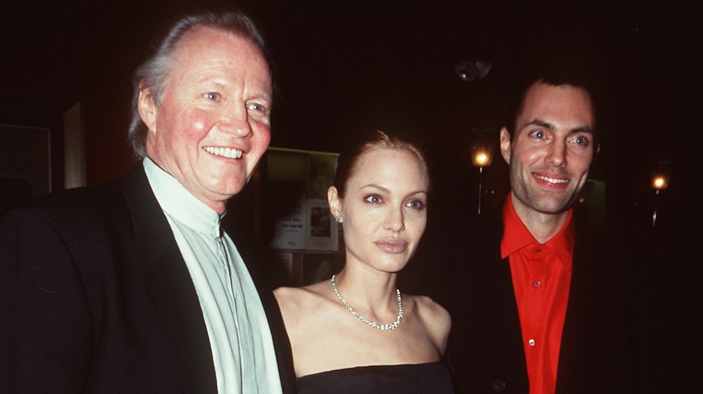 Angelina Jolie with her father and brother in 1999