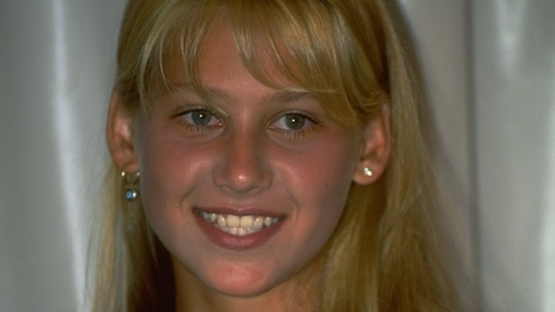 young Anna Kournikova smiling 