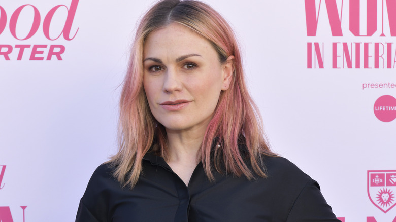 Anna Paquin looking steely and flinty