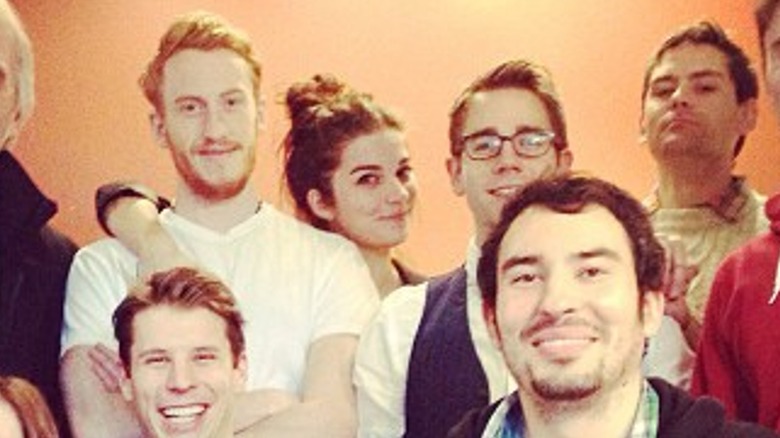 Annie Murphy with castmates in 2013