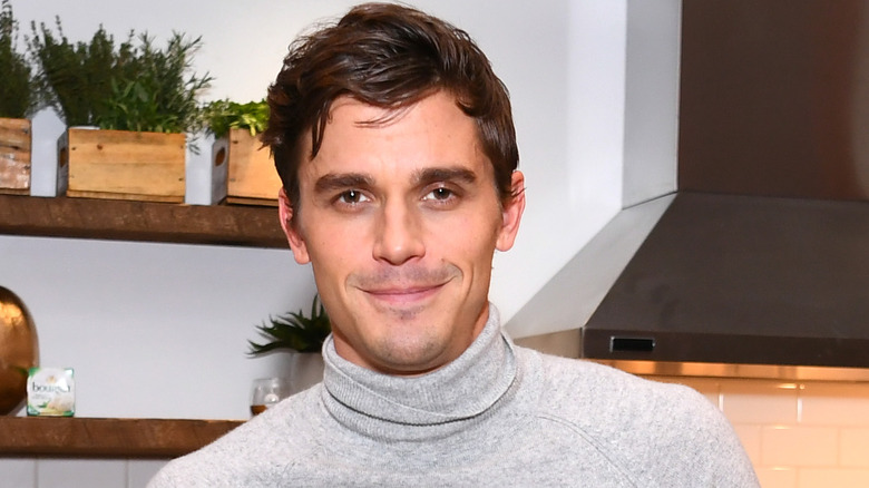 Antoni Porowski demonstrates preparing a signature dish as he attends Boursin Friendsgiving at Home Studios on November 7, 2018 in New York City.