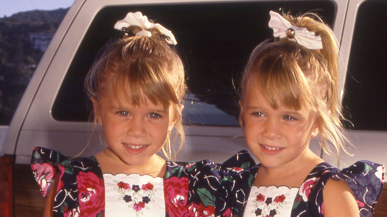 Young Mary-Kate, Ashley Olsen smiling