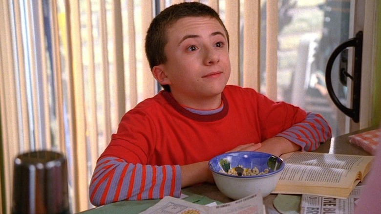 Atticus Shaffer as a child smirking