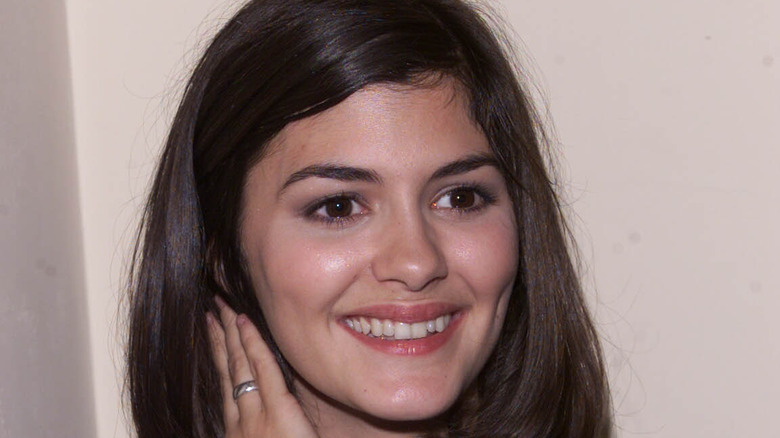 Young Audrey Tautou smiling