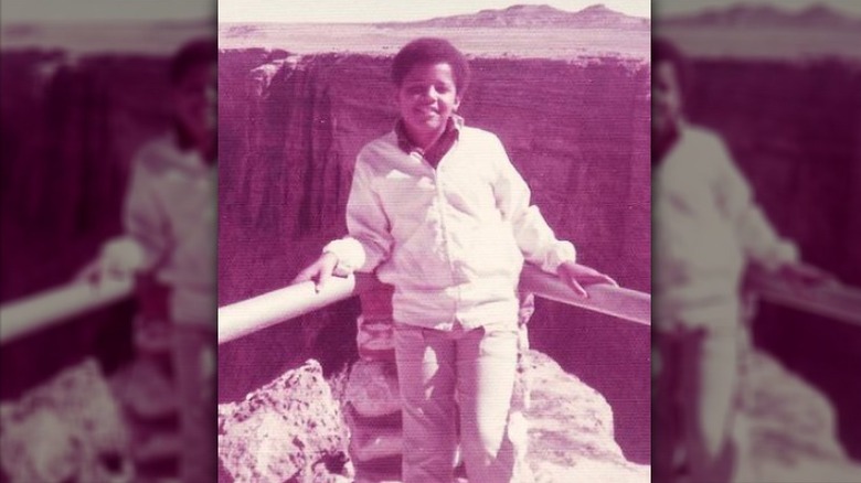 young Barack Obama posing