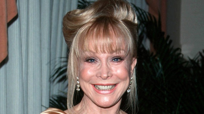 Barbara Eden widely smiling