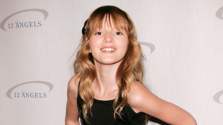 Bella Thorne as a child posing