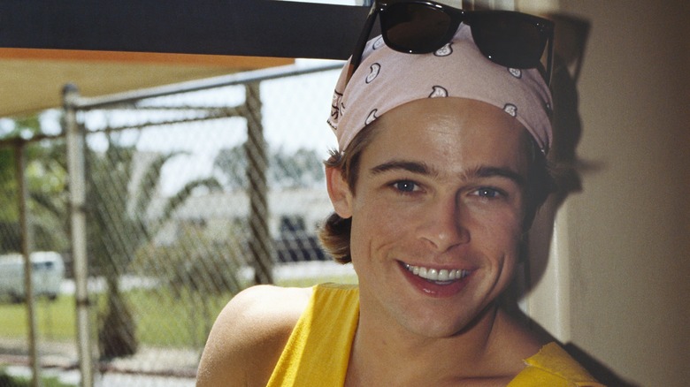 Brad Pitt wearing a bandana, sunglasses