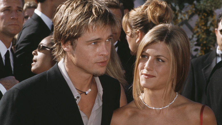 Jennifer Aniston looking at Brad Pitt