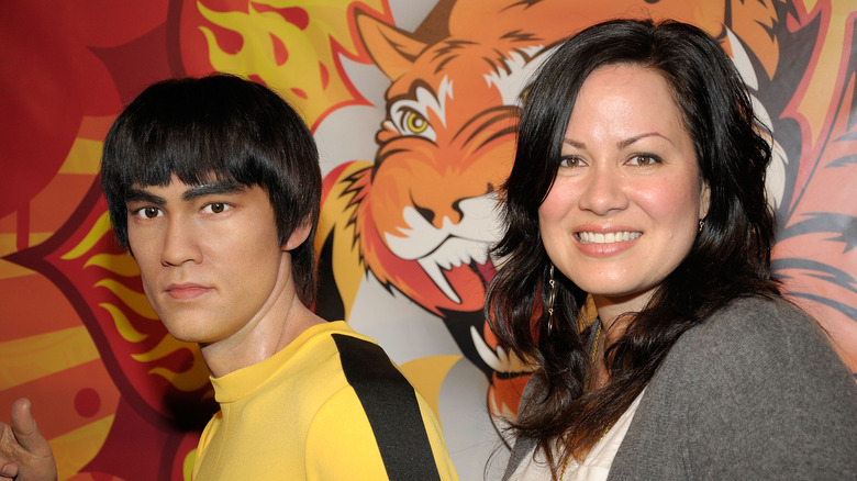 Shannon Lee with Bruce Lee wax figure