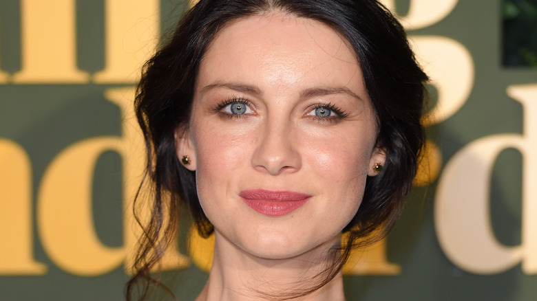 Caitríona Balfe staring directly into camera