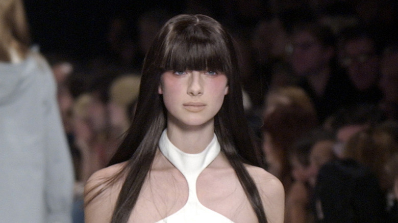 Caitríona Balfe walking the runway with bangs