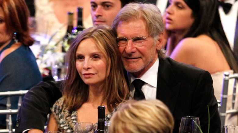 Harrison Ford wrapping his arm around Calista Flockhart