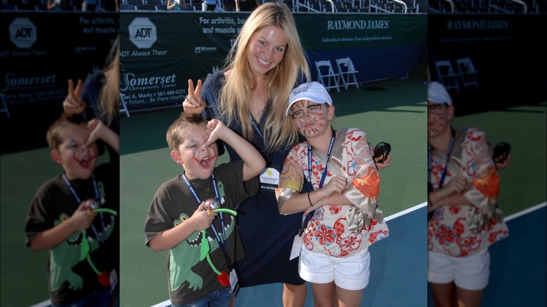 Candace Cameron Bure and two children with face paint