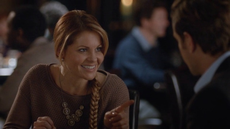 Candace Cameron Bure pointing in the first Aurora Teagarden movie