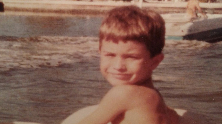 Young Chase Stokes at the beach