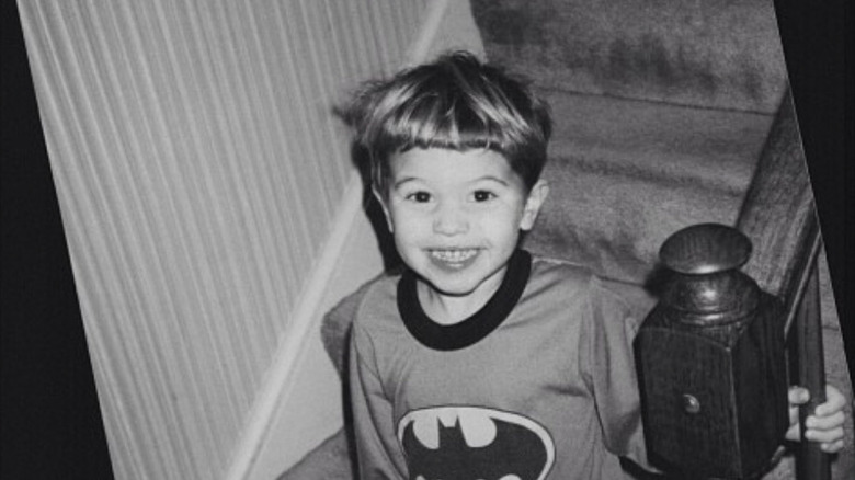 Young Chase Stokes in Batman pajamas