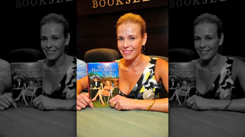 Chelsea Handler holding her book