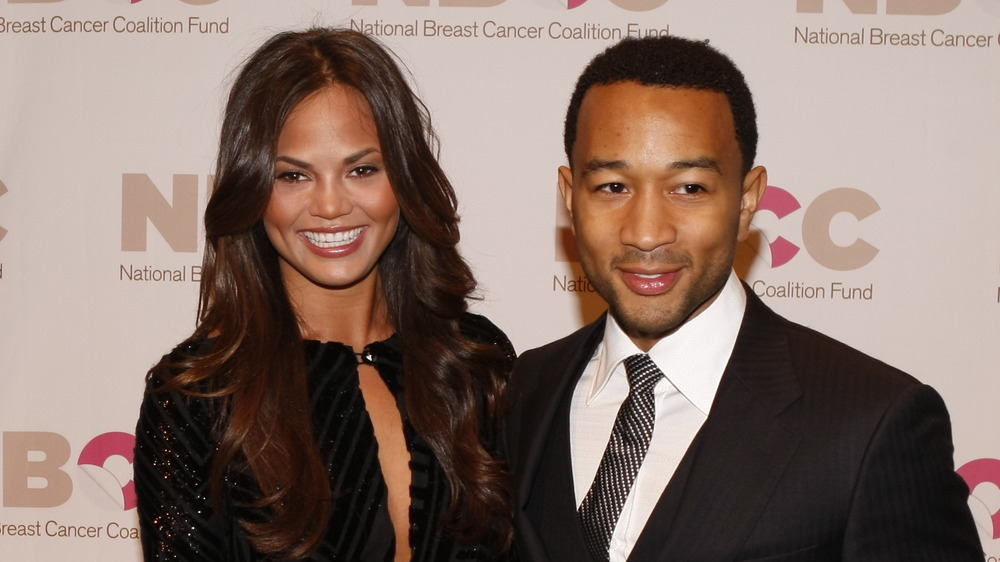 Chrissy Teigen and John Legend at a benefit in 2009