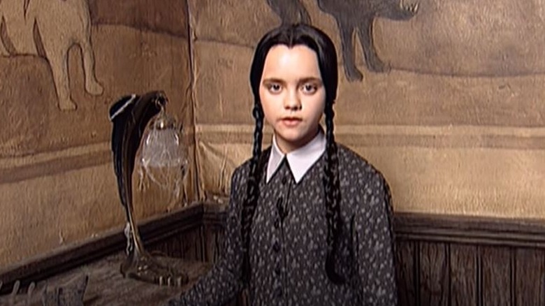 Young Christina Ricci stares at the camera