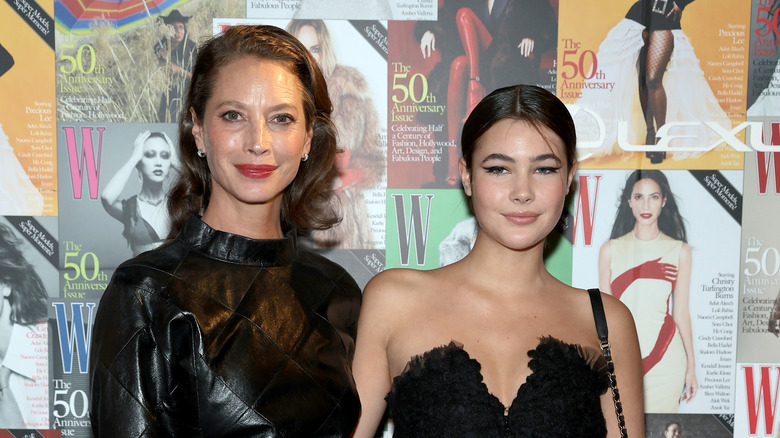 Christy Turlington with Grace Burns, both smiling