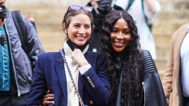 Christy Turlington with Naomi Campbell smiling