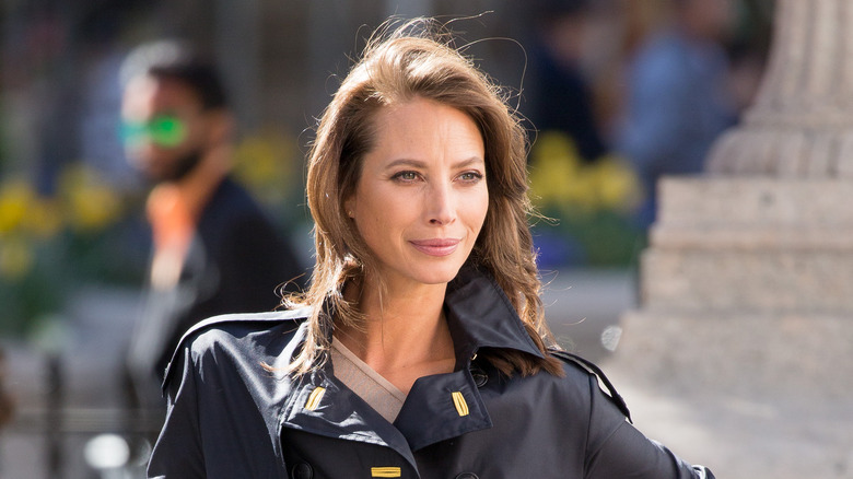 Christy Turlington posing in black jacket