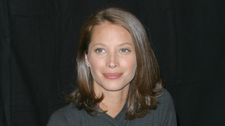 Christy Turlington with short hair, smiling