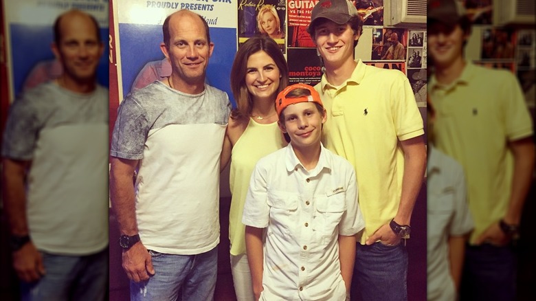 Kaitlan Collins with her dad and brothers