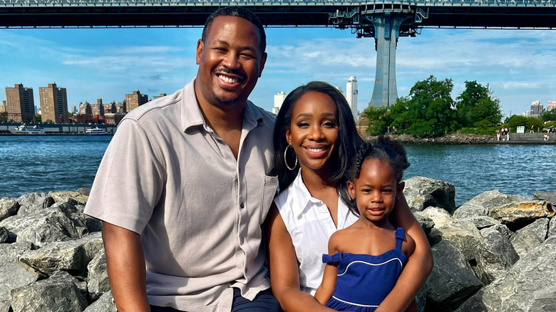 Marcus Richardson and Abby Phillip with daughter