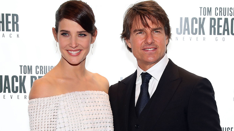 Cobie Smulders posing with Tom Cruise