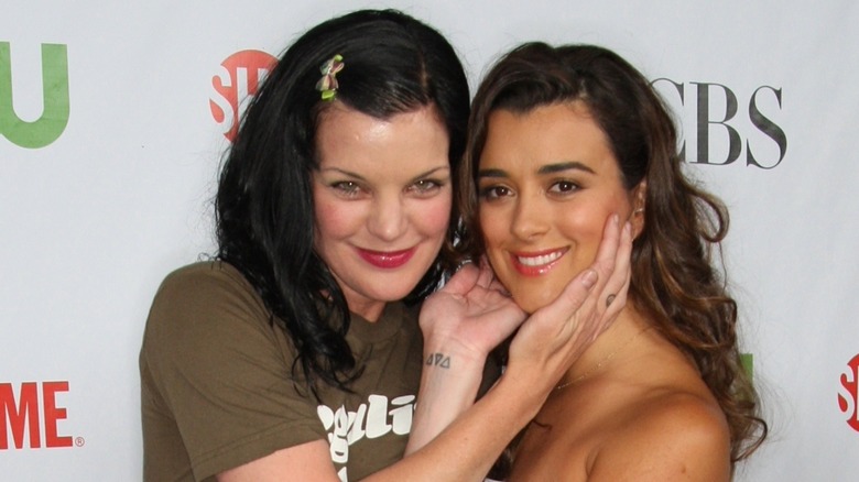 Pauley Perrette and Cote de Pablo smiling