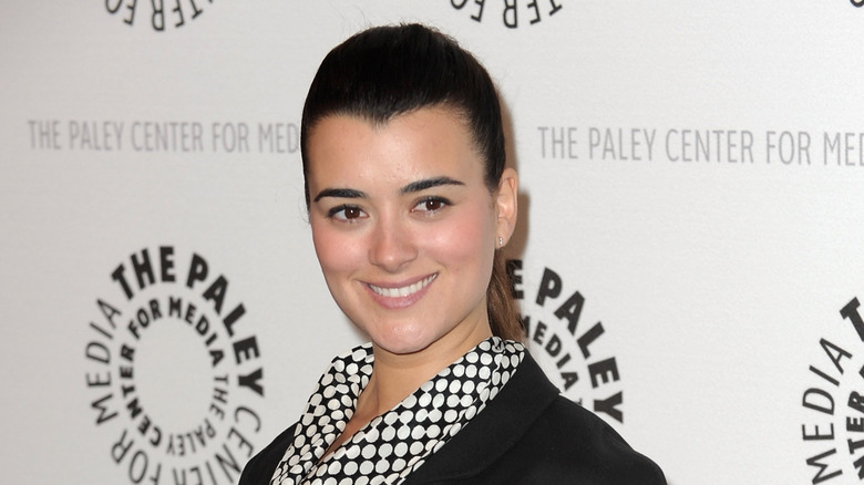 Cote de Pablo smiling