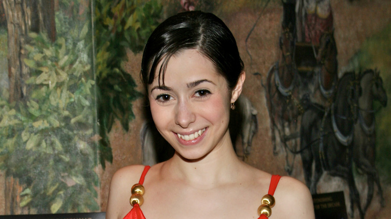 Cristin Milioti smiling at the opening of Coram Boy